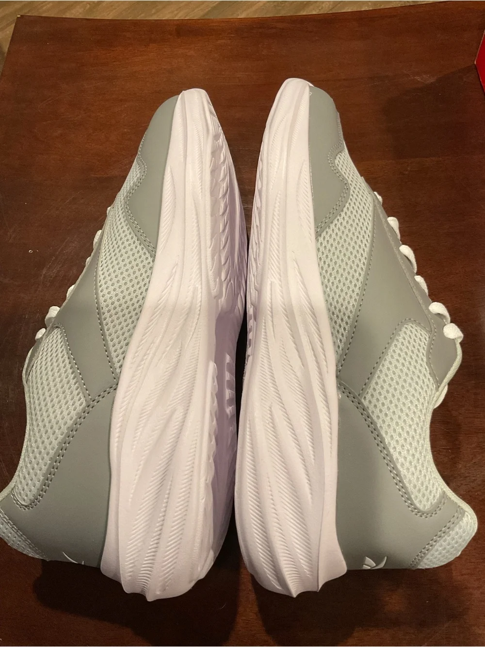 Men's grey running shoes on box size 9